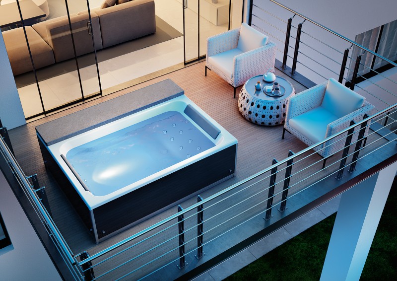 Whirlpool en massagebad met kleurentherapie - Magic Spa van Kinedo op terras